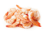 Plump, white shrimp with head shells removed. The cooked Tiger Shrimp have a beautiful orange speckling when removed from their red shell.