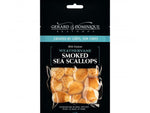 A 4 oz package of Gerard & Dominique Smoked Sea Scallops in a black vacuum sealed bag with white font.
